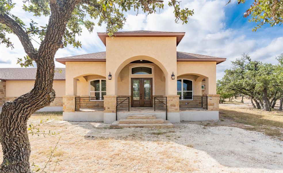 Exterior details and patio area of a home in , Harper (Image 1).
