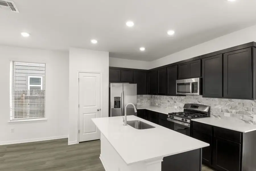 Representative furnished interior of a home built from the Elm by Pacesetter Homes in Blanco Vista, San Marcos (Image 10).