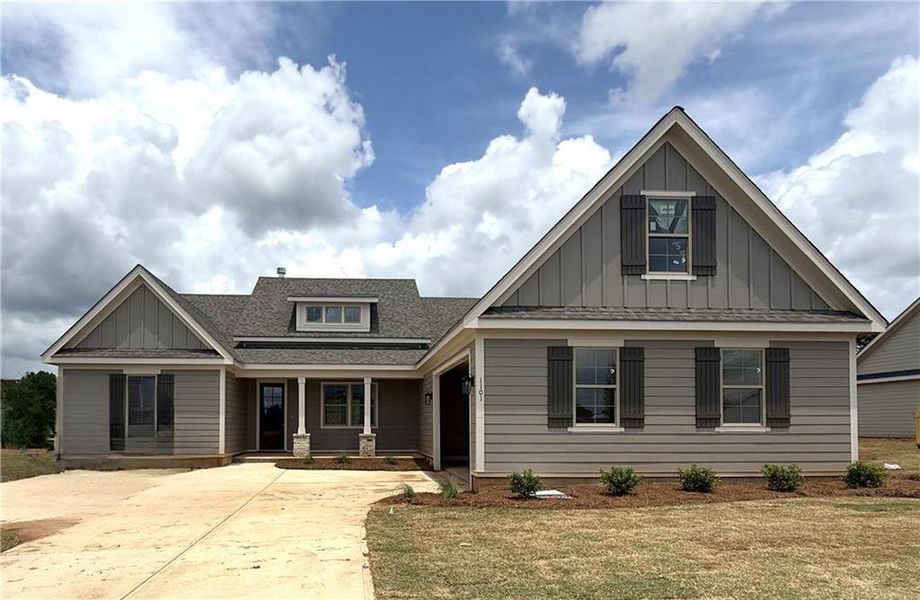 Front exterior of a new home in , Madison, GA, highlighting curb appeal (Image 1). Front exterior of a new home in , Madison, GA, highlighting curb appeal (Image 1).