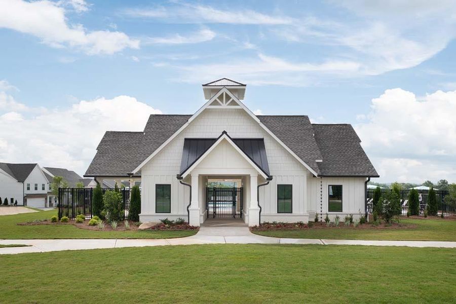 Front exterior of a new home in Eastlyn Crossing, Flowery Branch, GA, highlighting curb appeal (Image 5). Front exterior of a new home in Eastlyn Crossing, Flowery Branch, GA, highlighting curb appeal (Image 5).