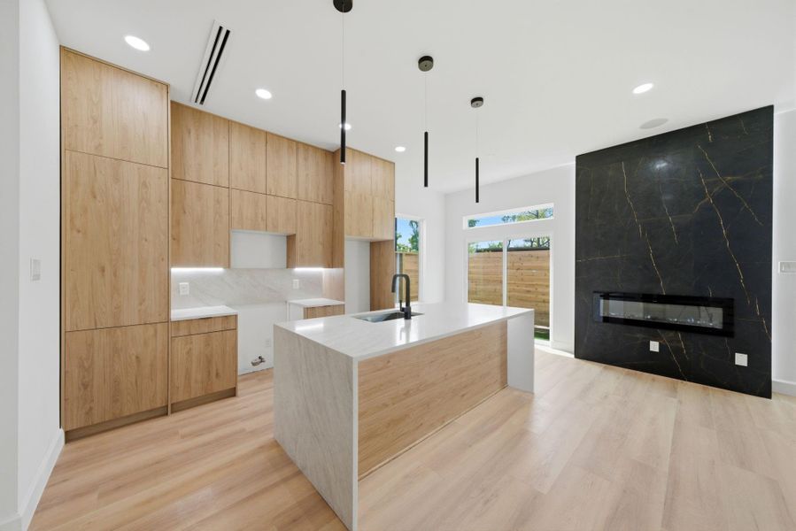 KitchenThe Taj Mahal quartz waterfall island every buyer stops on — kitchen open to the whole first floor * KitchenThe Taj Mahal quartz waterfall island every buyer stops on — kitchen open to the whole first floor *