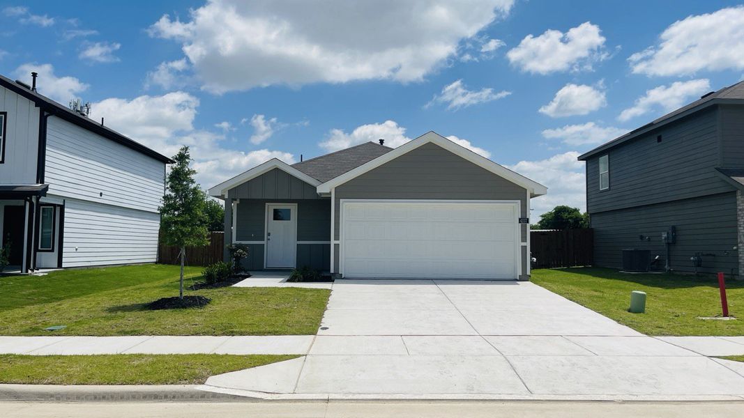 Front exterior of a new home in Sunnycreek, Fort Worth, TX, highlighting curb appeal (Image 1). Front exterior of a new home in Sunnycreek, Fort Worth, TX, highlighting curb appeal (Image 1).
