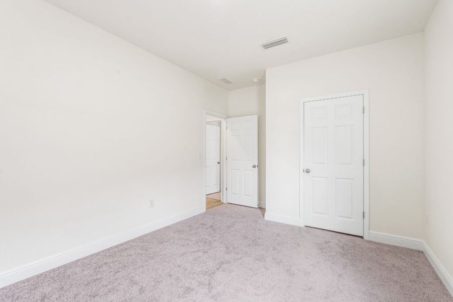 Spacious, unfurnished interior of a new home in Natureview, Freeport (Image 19).