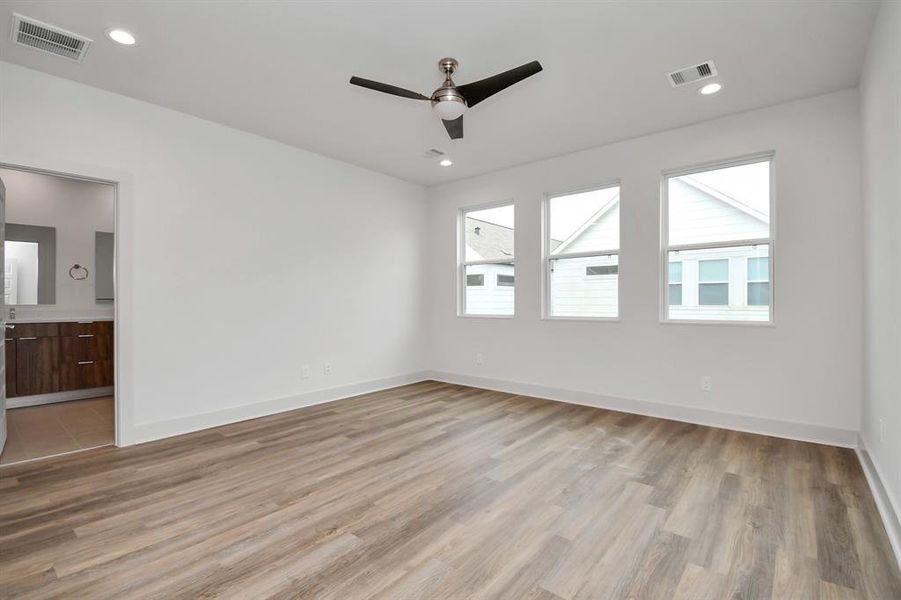 Primary Bedroom with Ceiling Fan - 10X14