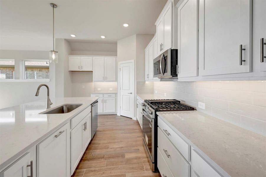 Furnished interior view inside a new home in The Grand Prairie 50’, Hockley (Image 11).