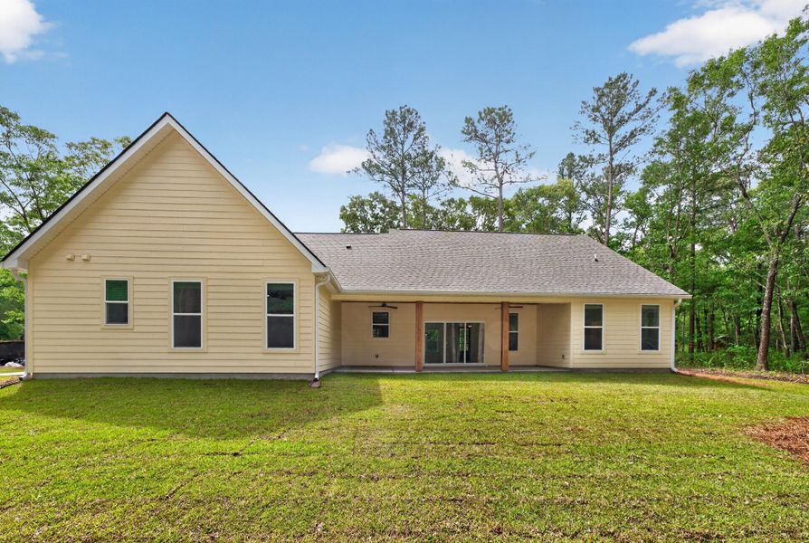 Exterior details and patio area of a home in , Johns Island (Image 24).
