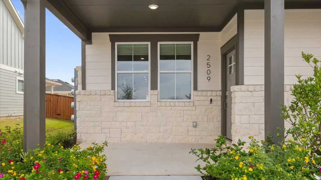 Exterior details and patio area of a home in Avery Centre, Round Rock (Image 3).
