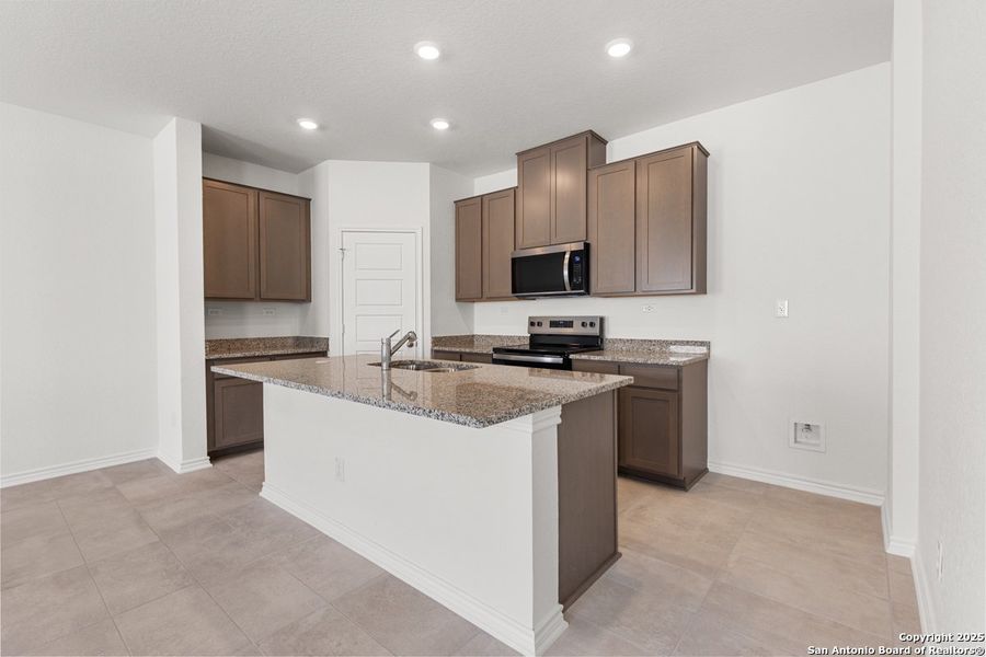 Furnished interior view inside a new home in Spanish Trails, San Antonio (Image 5).