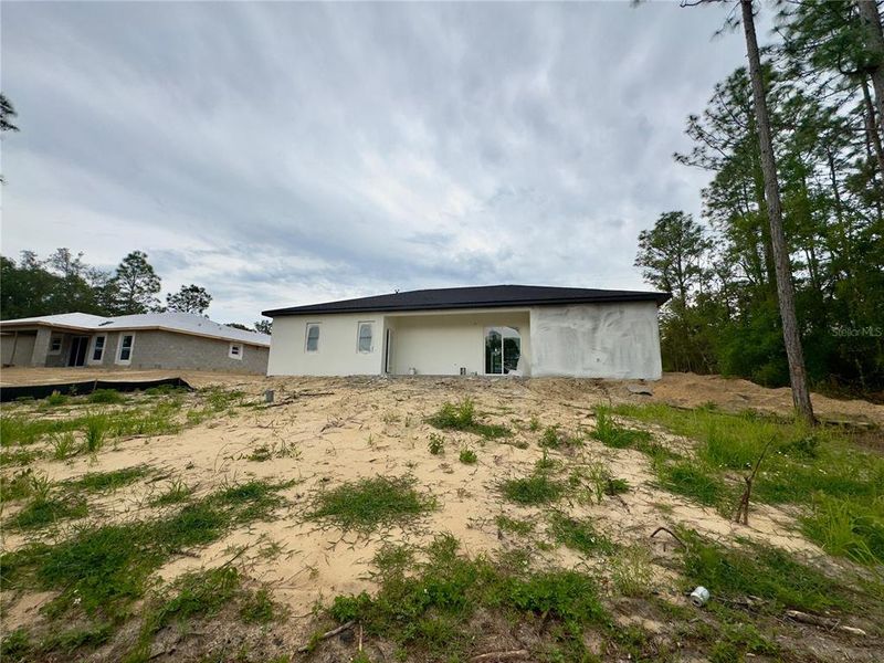 Front exterior of a new home in , Citrus Springs, FL, highlighting curb appeal (Image 17).