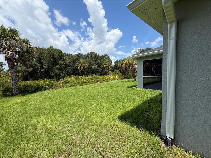 Exterior details and patio area of a home in , North Port (Image 25).