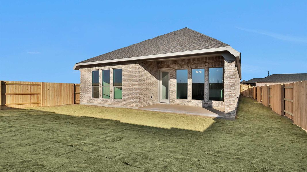 Exterior details and patio area of a home in Elyson, Katy (Image 2).