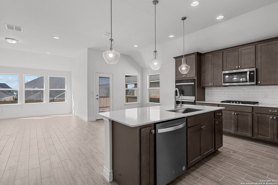 Furnished interior view inside a new home in Bison Ridge, San Antonio (Image 9).