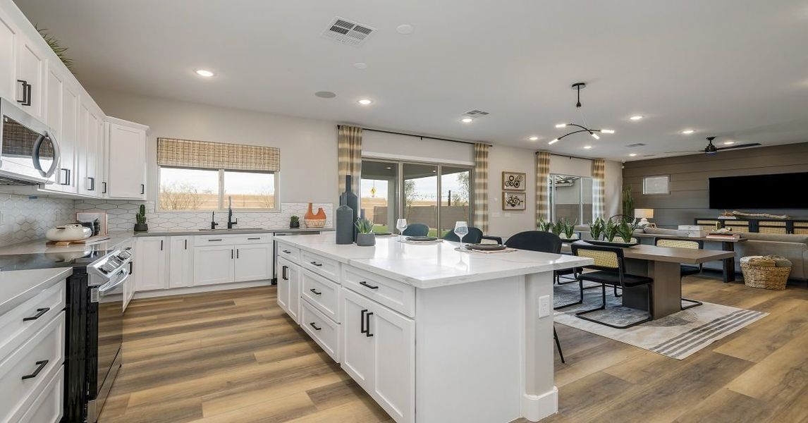 Representative furnished interior of a home built from the Camelback by William Ryan Homes in Alta Vida at Westpark, Buckeye (Image 12).