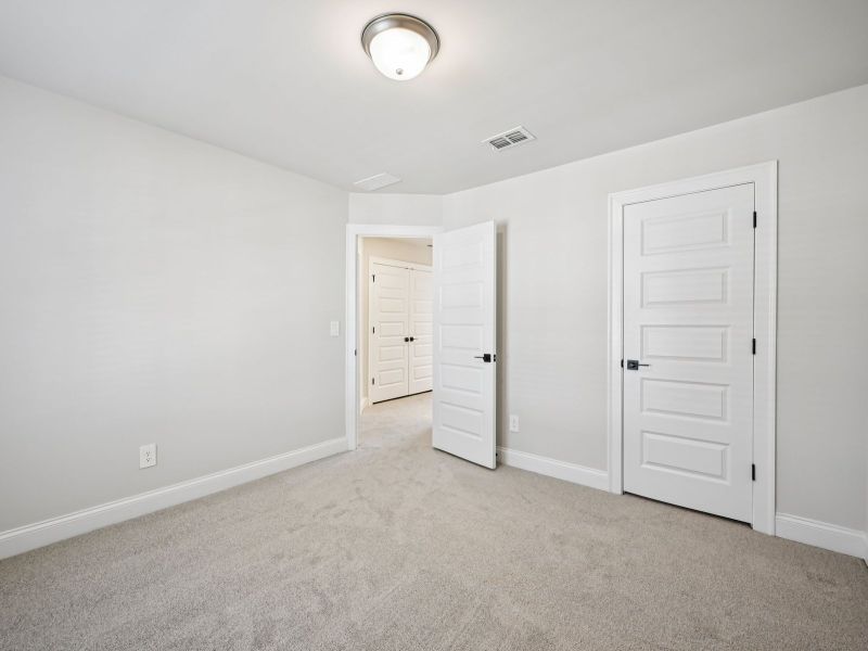 Spacious, unfurnished interior of a new home in Martin Springs - Highland Series, Lawrenceville (Image 17).