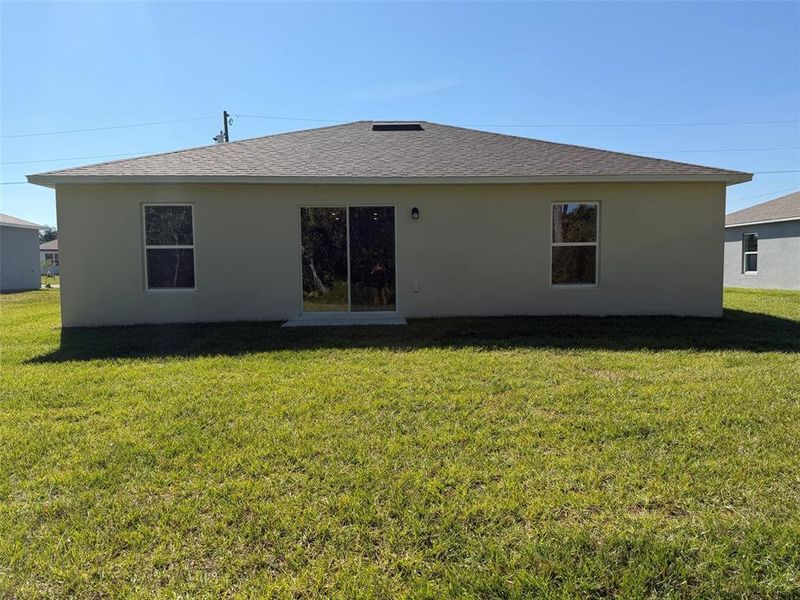 Exterior details and patio area of a home in Poinciana - Polk County, Poinciana (Image 2). Exterior details and patio area of a home in Poinciana - Polk County, Poinciana (Image 2).