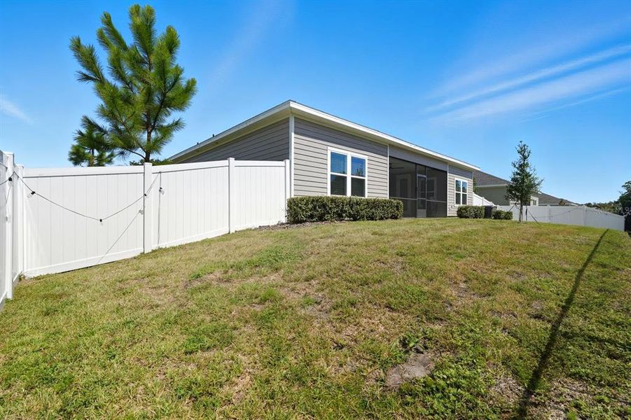 Exterior details and patio area of a home in , Ormond Beach (Image 24).
