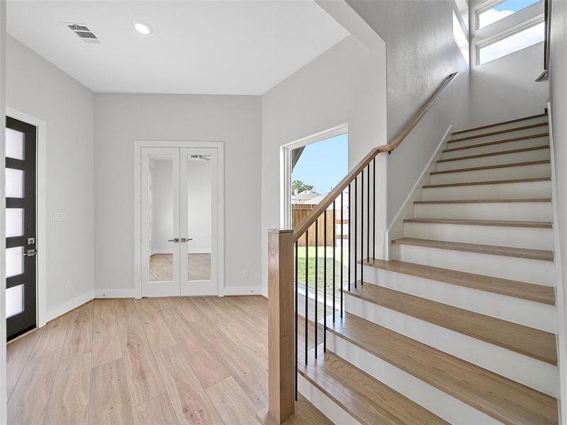 Foyer featuring light hardwood / wood-style floors