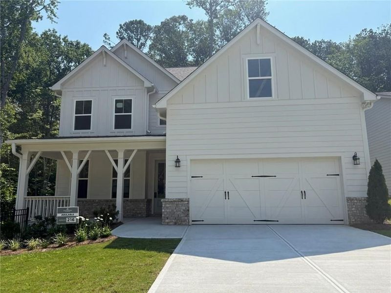 Front exterior of a new home in Riverwood, Dallas, GA, highlighting curb appeal (Image 43).