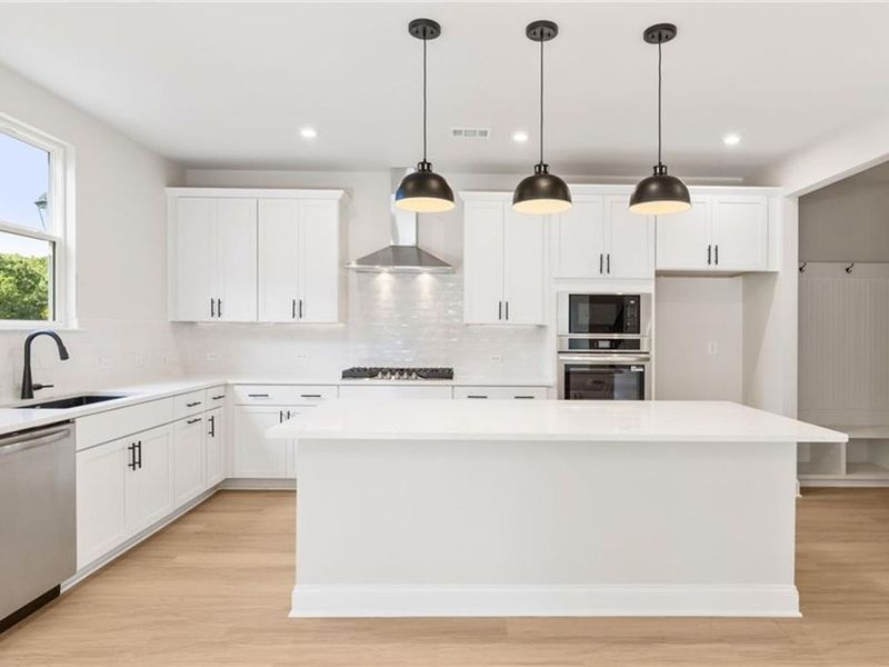 Furnished interior view inside a new home in Melody Lakeside Estates, Buford (Image 4).
