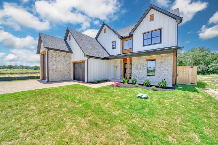 Front exterior of a new home in , Somerville, TX, highlighting curb appeal (Image 25). Front exterior of a new home in , Somerville, TX, highlighting curb appeal (Image 25).