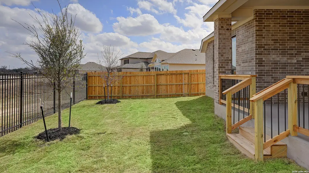 Exterior details and patio area of a home in Alsatian Oaks, Castroville (Image 18).