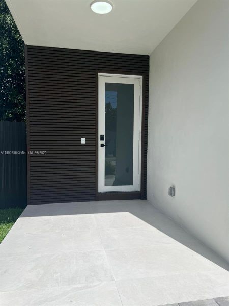 Exterior details and patio area of a home in , Miami (Image 3). Exterior details and patio area of a home in , Miami (Image 3).