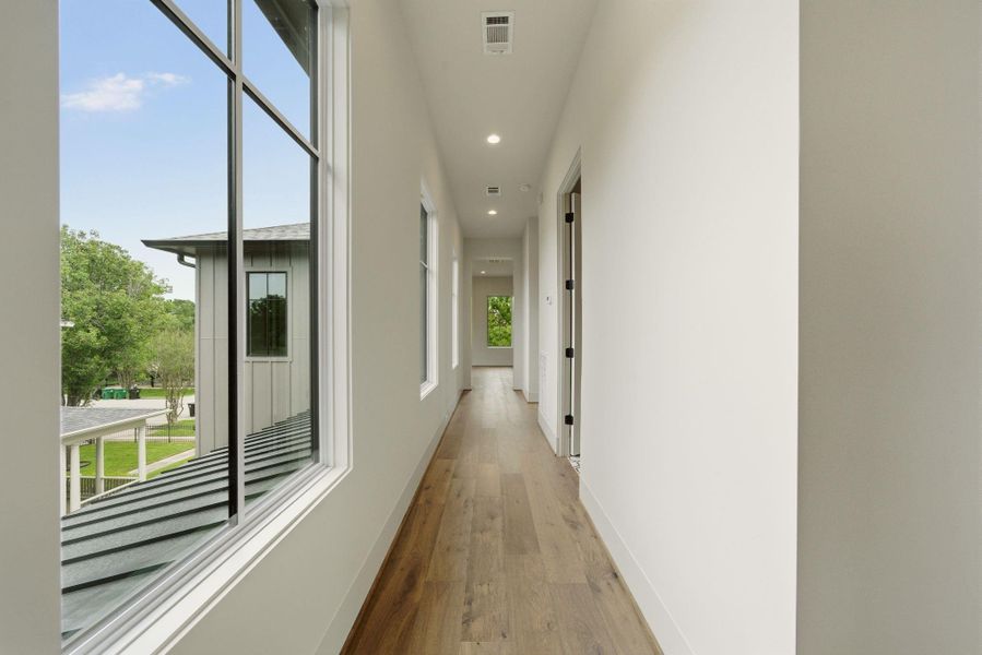 Long hallway lined with windows! Amazing natural light.