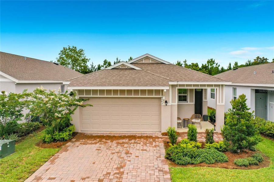 Front exterior of a new home in Ocala Preserve, Ocala, FL, highlighting curb appeal (Image 1). Front exterior of a new home in Ocala Preserve, Ocala, FL, highlighting curb appeal (Image 1).