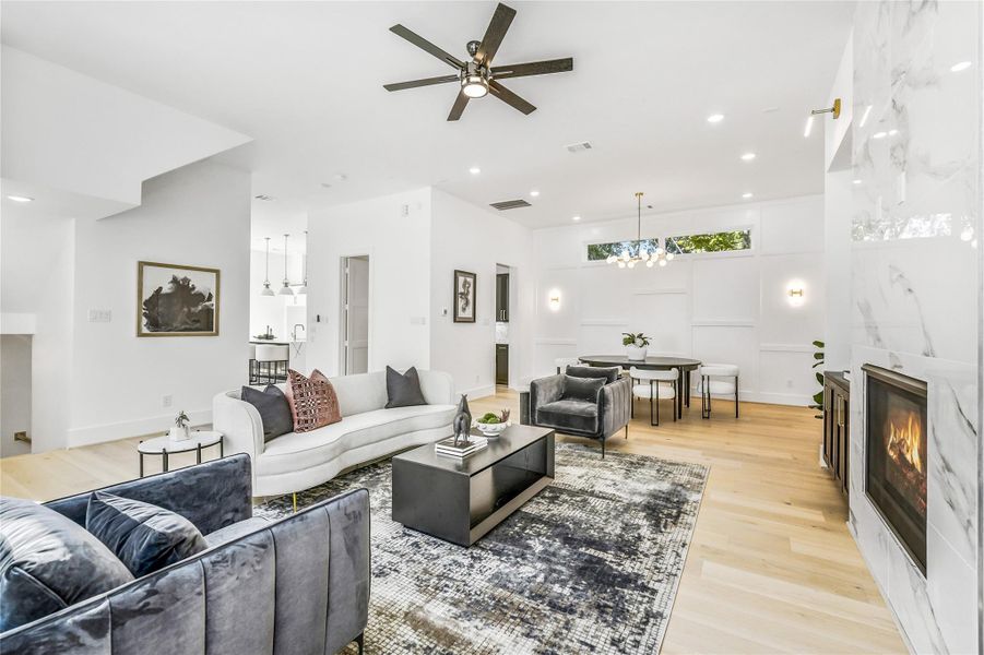 Experience true open-concept living—where modern sophistication and lifestyle convenience converge. The living area connects effortlessly to the dining and gourmet kitchen, offering a cohesive layout designed for today’s busy professionals.Whether you’re enjoying a quiet dinner or hosting a medical residency celebration, every detail exudes understated luxury.