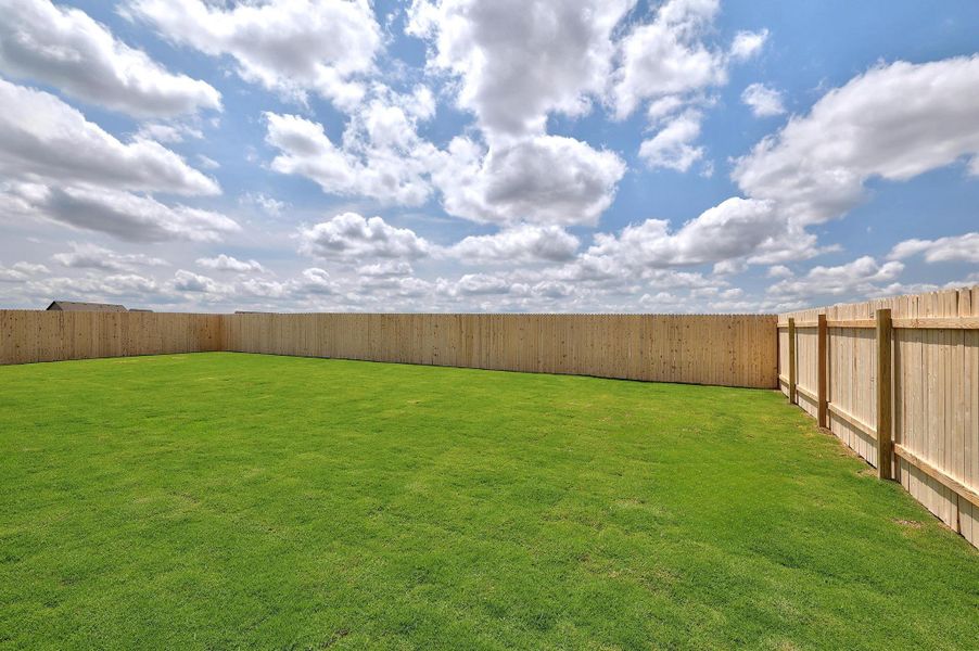 Exterior details and patio area of a home in Santa Rita Ranch, Liberty Hill (Image 22).
