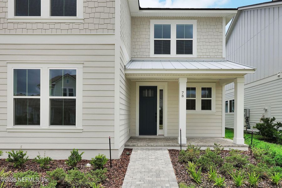 Exterior details and patio area of a home in Seabrook Village at Seabrook, Nocatee (Image 3).