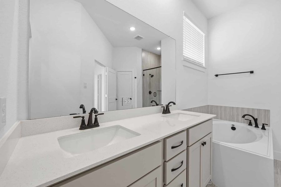 Furnished interior view inside a new home in Bridgeland, Cypress (Image 9).