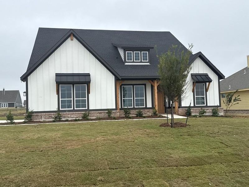 Front exterior of a new home in Fairview Meadows, New Fairview, TX, highlighting curb appeal (Image 12). Front exterior of a new home in Fairview Meadows, New Fairview, TX, highlighting curb appeal (Image 12).