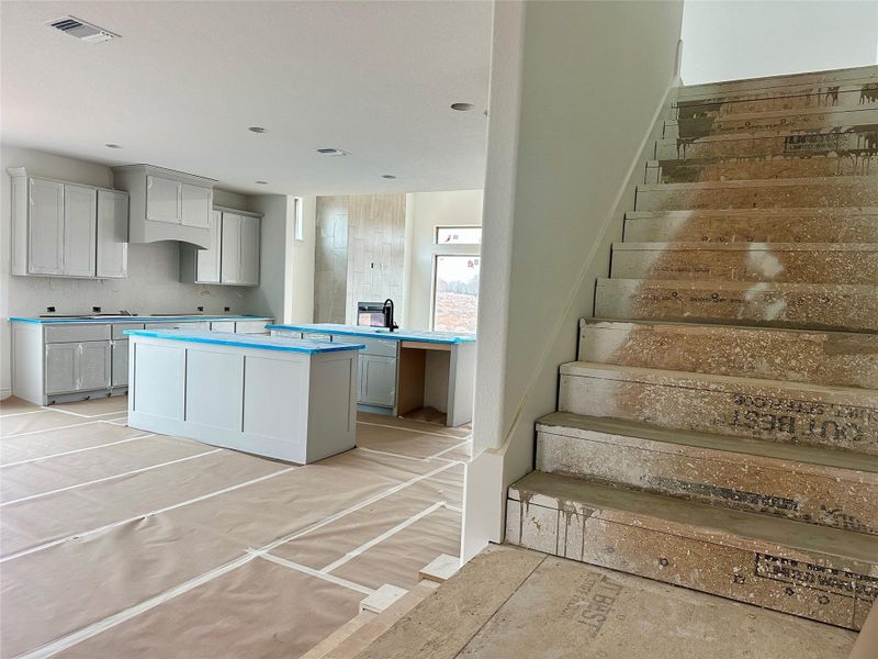 Kitchen featuring a center island and gray cabinetry
