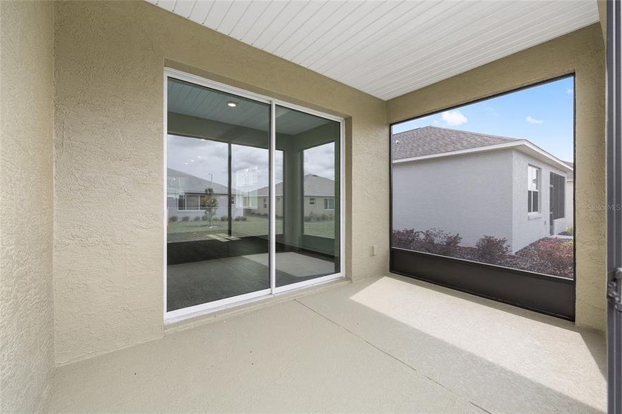 Exterior details and patio area of a home in On Top of the World Communities, Ocala (Image 9).
