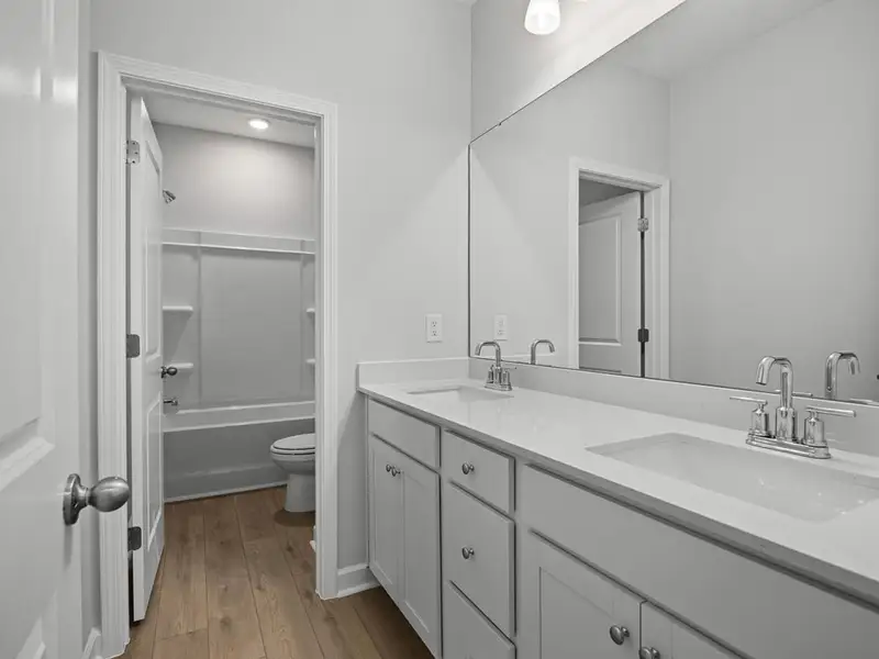 Furnished interior view inside a new home in Sage on North Main, Wake Forest (Image 10). Furnished interior view inside a new home in Sage on North Main, Wake Forest (Image 10).