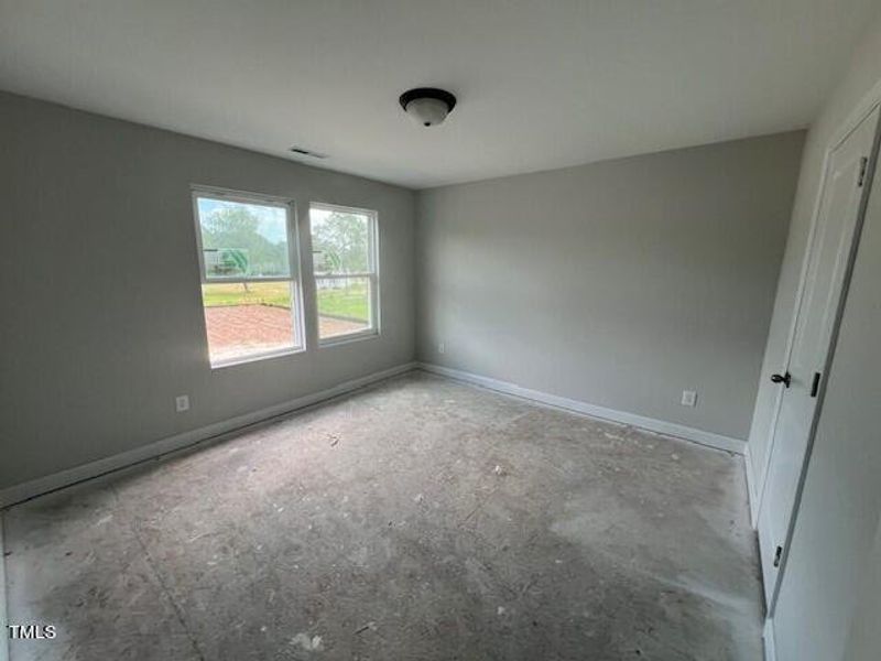 Spacious, unfurnished interior of a new home in Wellers Knoll, Lillington (Image 56).