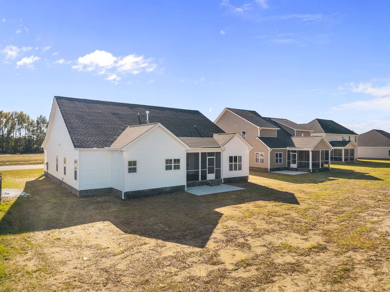 Exterior details and patio area of a home in The Preserve at Langston, Winterville (Image 35).