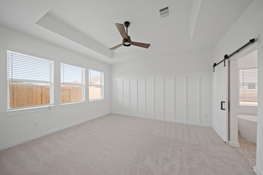 Spacious primary suite with feature wall (*Photo not of actual home and used for illustration purposes only.) Spacious primary suite with feature wall (*Photo not of actual home and used for illustration purposes only.)