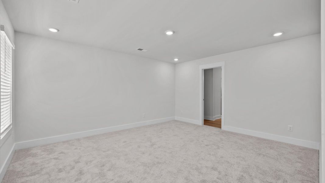 Representative furnished interior of a home built from the Jasmine by DRB Homes in Harrier Point, Woodruff (Image 23).