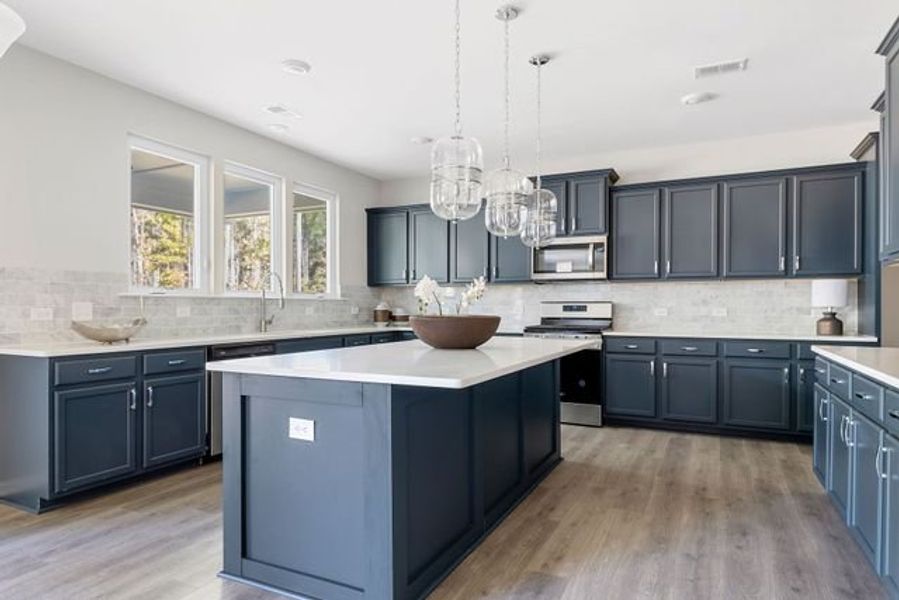 Representative furnished interior of a home built from the Winslow P by True Homes in Homecoming, Ravenel (Image 4).
