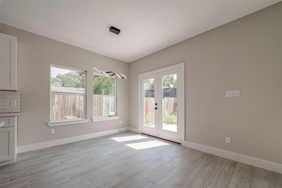 Dining area with backdoor Dining area with backdoor
