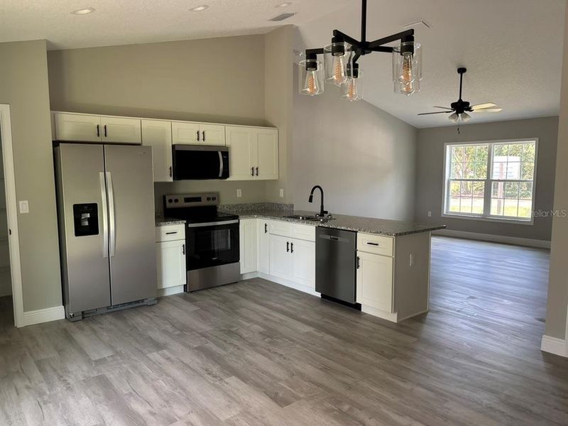 Furnished interior view inside a new home in , Dunnellon (Image 7).
