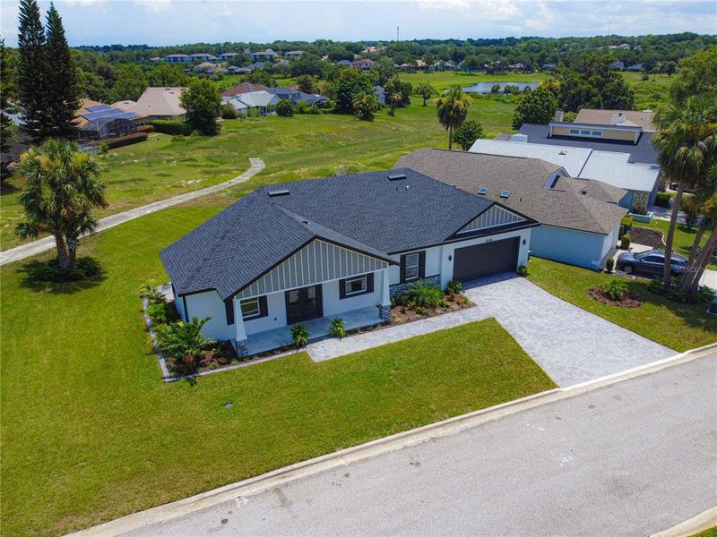 Front exterior of a new home in , Apopka, FL, highlighting curb appeal (Image 22).