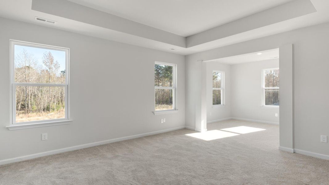 Spacious, unfurnished interior of a new home in The Haven at Indigo Preserve, Leland (Image 30).
