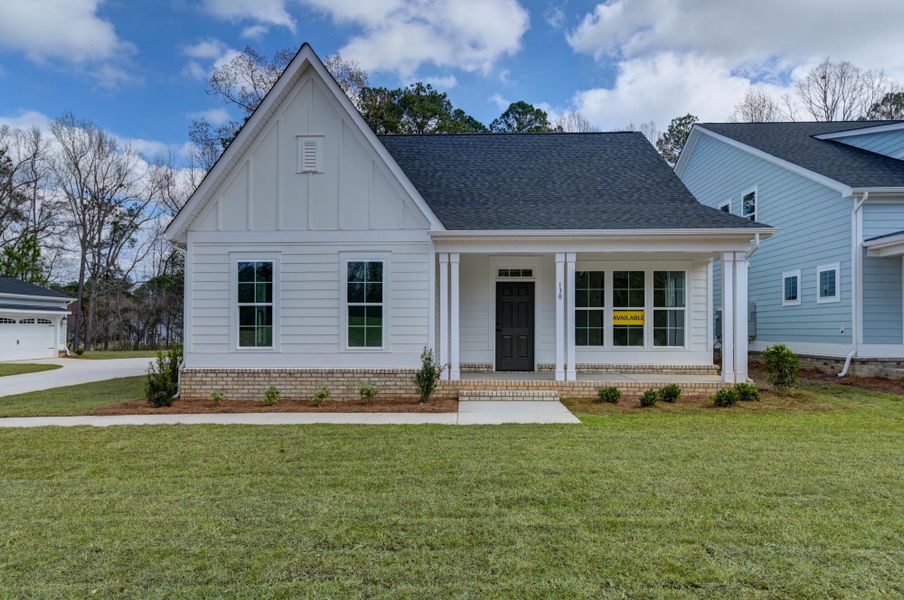 Front exterior of a new home in Clubside Reserve at Summerlake, Lexington, SC, highlighting curb appeal (Image 1). Front exterior of a new home in Clubside Reserve at Summerlake, Lexington, SC, highlighting curb appeal (Image 1).