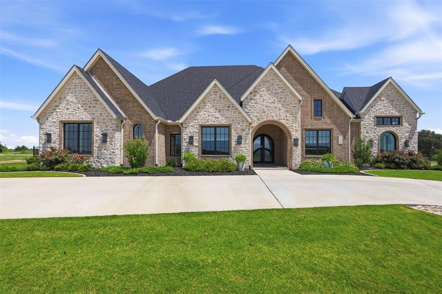 Front exterior of a new home in , Denton, TX, highlighting curb appeal (Image 1). Front exterior of a new home in , Denton, TX, highlighting curb appeal (Image 1).