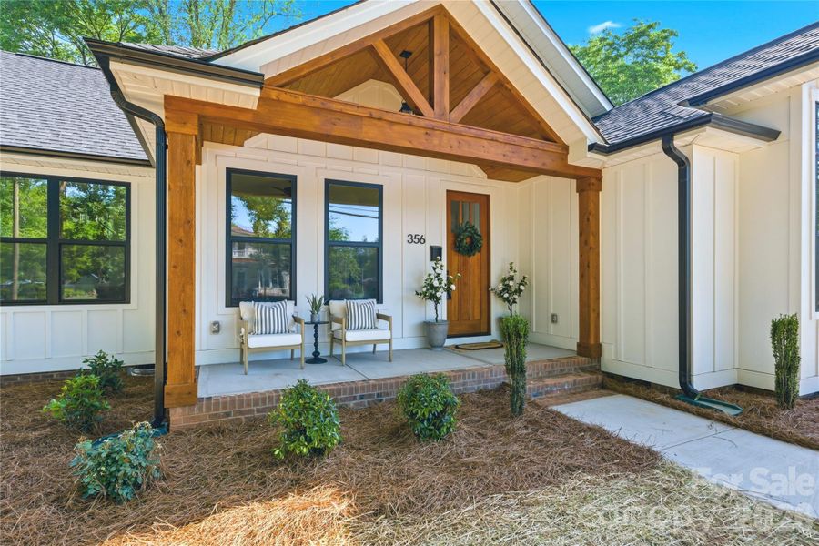 Clean lines, warm woodwork, and modern farmhouse character in the heart of McAdenville — welcoming and beautifully balanced, designed to feel like home from the very first glance