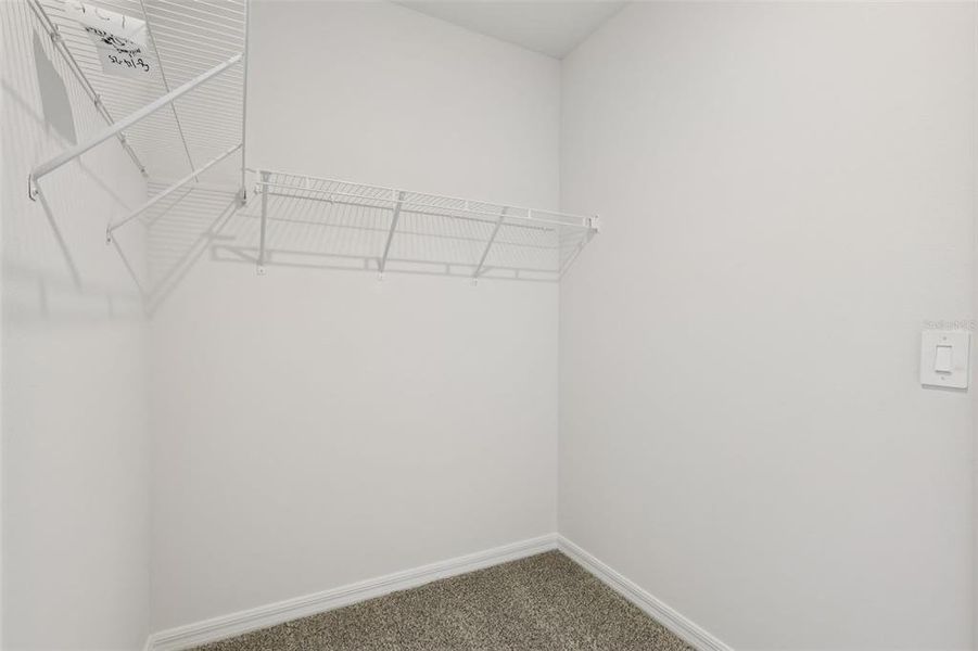 Spacious, unfurnished interior of a new home in Lake Deer Estates - Signature Series, Poinciana (Image 31).