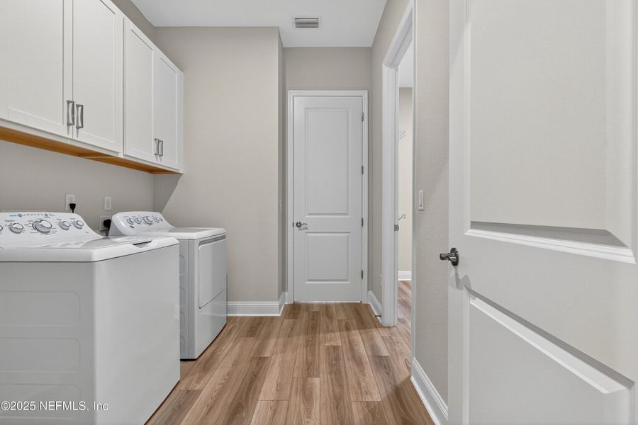 Furnished interior view inside a new home in RiverTown - WaterSong, St. Johns (Image 37).